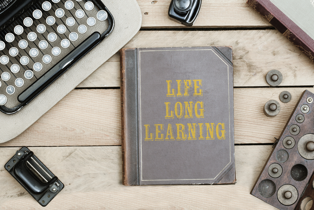 Life,Long,Learning,Text,On,Cover,Of,Old,Book,On